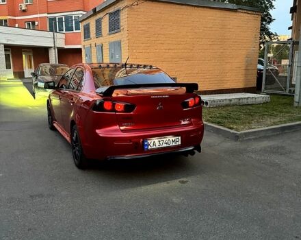 Красный Мицубиси Лансер, объемом двигателя 2 л и пробегом 260 тыс. км за 7300 $, фото 8 на Automoto.ua