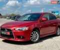 Червоний Міцубісі Lancer, об'ємом двигуна 1.8 л та пробігом 142 тис. км за 7390 $, фото 1 на Automoto.ua