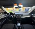 Красный Мицубиси Лансер, объемом двигателя 2 л и пробегом 260 тыс. км за 7300 $, фото 5 на Automoto.ua