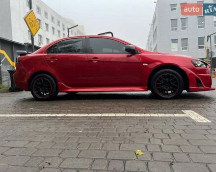 Красный Мицубиси Лансер, объемом двигателя 2 л и пробегом 230 тыс. км за 6700 $, фото 4 на Automoto.ua