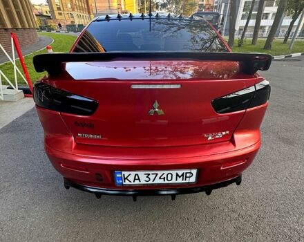 Мицубиси Лансер 2012 в Харькове на Automoto.ua Красный Мицубиси Лансер, объемом двигателя 2 л и пробегом 260 тыс. км за 6900 $, фото 3 на Automoto.ua