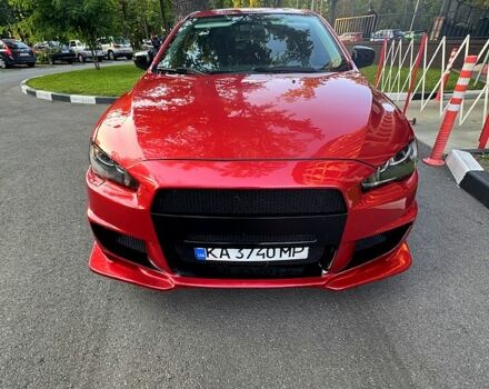 Красный Мицубиси Лансер, объемом двигателя 2 л и пробегом 260 тыс. км за 7300 $, фото 2 на Automoto.ua