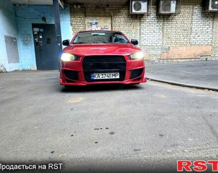 Красный Мицубиси Лансер, объемом двигателя 2 л и пробегом 160 тыс. км за 7500 $, фото 3 на Automoto.ua