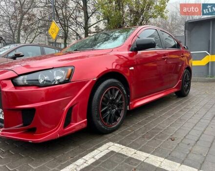 Красный Мицубиси Лансер, объемом двигателя 2 л и пробегом 230 тыс. км за 6700 $, фото 2 на Automoto.ua