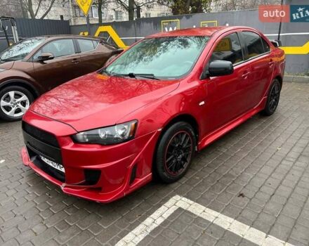 Красный Мицубиси Лансер, объемом двигателя 2 л и пробегом 230 тыс. км за 6700 $, фото 3 на Automoto.ua