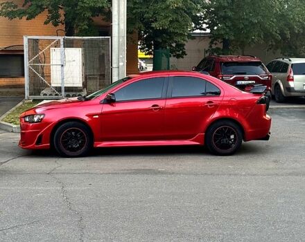 Красный Мицубиси Лансер, объемом двигателя 2 л и пробегом 260 тыс. км за 7300 $, фото 3 на Automoto.ua