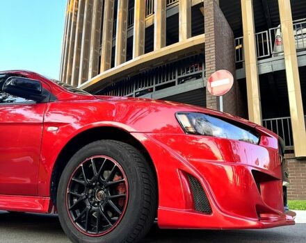 Мицубиси Лансер 2012 в Харькове на Automoto.ua Красный Мицубиси Лансер, объемом двигателя 2 л и пробегом 260 тыс. км за 6900 $, фото 1 на Automoto.ua