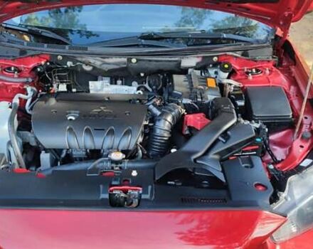 Красный Мицубиси Лансер, объемом двигателя 2 л и пробегом 180 тыс. км за 8100 $, фото 4 на Automoto.ua