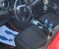 Красный Мицубиси Лансер, объемом двигателя 2 л и пробегом 180 тыс. км за 8100 $, фото 1 на Automoto.ua