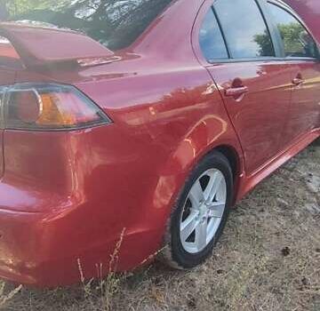 Красный Мицубиси Лансер, объемом двигателя 2 л и пробегом 180 тыс. км за 8100 $, фото 5 на Automoto.ua