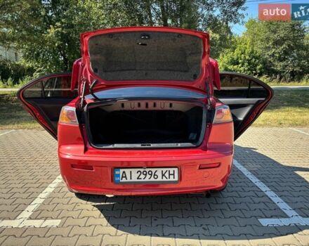 Червоний Міцубісі Lancer, об'ємом двигуна 2 л та пробігом 227 тис. км за 7800 $, фото 14 на Automoto.ua