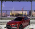 Червоний Міцубісі Lancer, об'ємом двигуна 2.36 л та пробігом 277 тис. км за 7088 $, фото 1 на Automoto.ua