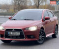 Червоний Міцубісі Lancer, об'ємом двигуна 2.36 л та пробігом 175 тис. км за 7999 $, фото 1 на Automoto.ua