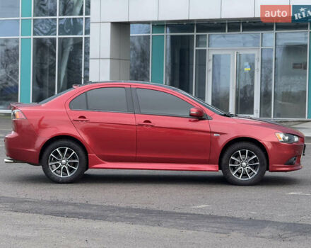 Червоний Міцубісі Lancer, об'ємом двигуна 2.36 л та пробігом 175 тис. км за 7999 $, фото 5 на Automoto.ua