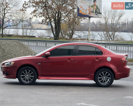 Червоний Міцубісі Lancer, об'ємом двигуна 2.36 л та пробігом 175 тис. км за 7999 $, фото 1 на Automoto.ua