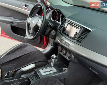 Червоний Міцубісі Lancer, об'ємом двигуна 2.36 л та пробігом 175 тис. км за 7999 $, фото 12 на Automoto.ua