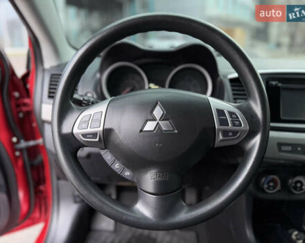 Червоний Міцубісі Lancer, об'ємом двигуна 2.36 л та пробігом 175 тис. км за 7999 $, фото 19 на Automoto.ua
