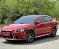 Красный Мицубиси Лансер, объемом двигателя 2.4 л и пробегом 179 тыс. км за 8499 $, фото 1 на Automoto.ua