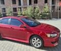 Червоний Міцубісі Lancer, об'ємом двигуна 1.8 л та пробігом 115 тис. км за 10300 $, фото 1 на Automoto.ua