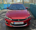 Красный Мицубиси Лансер, объемом двигателя 2.36 л и пробегом 170 тыс. км за 9000 $, фото 1 на Automoto.ua