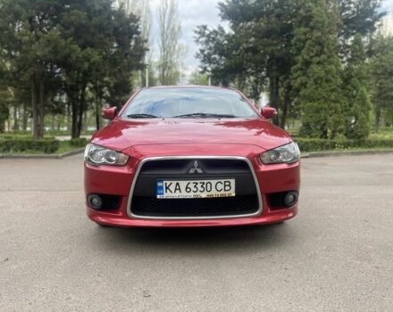 Червоний Міцубісі Lancer, об'ємом двигуна 2 л та пробігом 190 тис. км за 8500 $, фото 1 на Automoto.ua