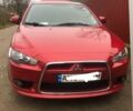 Червоний Міцубісі Lancer, об'ємом двигуна 2 л та пробігом 230 тис. км за 8500 $, фото 1 на Automoto.ua