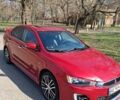 Червоний Міцубісі Lancer, об'ємом двигуна 2.4 л та пробігом 122 тис. км за 12000 $, фото 1 на Automoto.ua