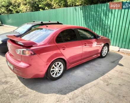 Червоний Міцубісі Lancer, об'ємом двигуна 2.4 л та пробігом 193 тис. км за 10200 $, фото 1 на Automoto.ua