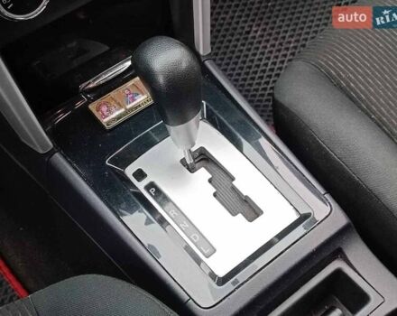 Червоний Міцубісі Lancer, об'ємом двигуна 2 л та пробігом 136 тис. км за 10990 $, фото 22 на Automoto.ua