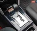 Червоний Міцубісі Lancer, об'ємом двигуна 2 л та пробігом 136 тис. км за 10990 $, фото 22 на Automoto.ua