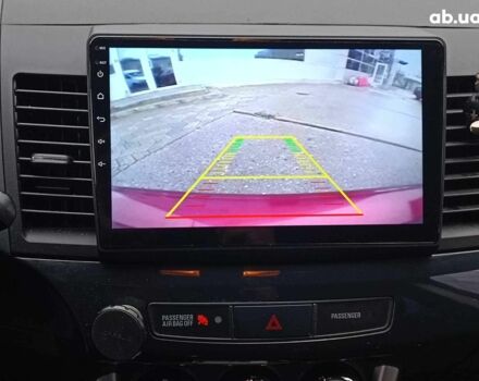 Красный Мицубиси Лансер, объемом двигателя 2 л и пробегом 136 тыс. км за 10990 $, фото 23 на Automoto.ua