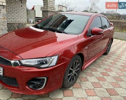 Красный Мицубиси Лансер, объемом двигателя 2 л и пробегом 134 тыс. км за 10500 $, фото 2 на Automoto.ua
