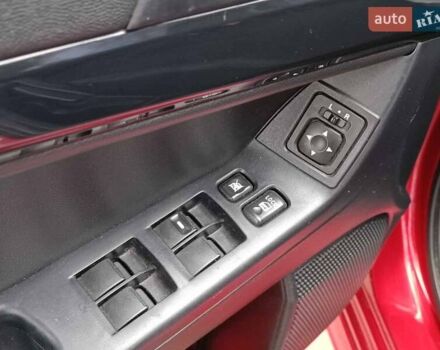 Червоний Міцубісі Lancer, об'ємом двигуна 2 л та пробігом 136 тис. км за 10990 $, фото 17 на Automoto.ua