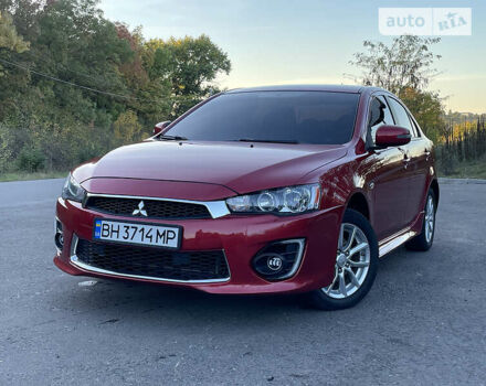 Червоний Міцубісі Lancer, об'ємом двигуна 2 л та пробігом 140 тис. км за 9900 $, фото 26 на Automoto.ua