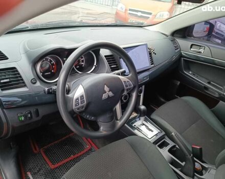 Красный Мицубиси Лансер, объемом двигателя 2 л и пробегом 136 тыс. км за 10990 $, фото 14 на Automoto.ua