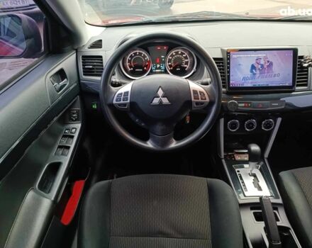 Красный Мицубиси Лансер, объемом двигателя 2 л и пробегом 136 тыс. км за 10990 $, фото 25 на Automoto.ua