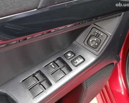 Красный Мицубиси Лансер, объемом двигателя 2 л и пробегом 136 тыс. км за 10990 $, фото 16 на Automoto.ua