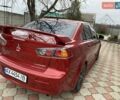 Красный Мицубиси Лансер, объемом двигателя 2 л и пробегом 134 тыс. км за 10500 $, фото 6 на Automoto.ua