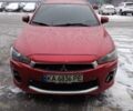 Красный Мицубиси Лансер, объемом двигателя 2 л и пробегом 148 тыс. км за 10200 $, фото 1 на Automoto.ua
