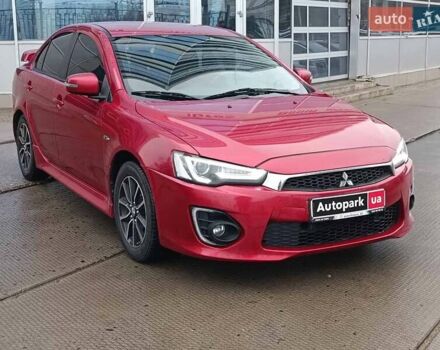 Червоний Міцубісі Lancer, об'ємом двигуна 2 л та пробігом 136 тис. км за 10990 $, фото 2 на Automoto.ua