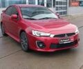 Червоний Міцубісі Lancer, об'ємом двигуна 2 л та пробігом 136 тис. км за 10990 $, фото 2 на Automoto.ua