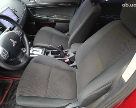 Красный Мицубиси Лансер, объемом двигателя 2 л и пробегом 136 тыс. км за 10990 $, фото 15 на Automoto.ua