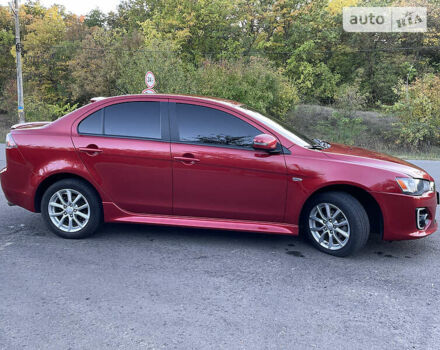 Червоний Міцубісі Lancer, об'ємом двигуна 2 л та пробігом 140 тис. км за 9900 $, фото 11 на Automoto.ua