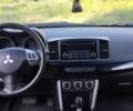 Красный Мицубиси Лансер, объемом двигателя 2 л и пробегом 201 тыс. км за 8200 $, фото 17 на Automoto.ua