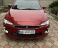 Красный Мицубиси Лансер, объемом двигателя 2 л и пробегом 134 тыс. км за 10500 $, фото 1 на Automoto.ua