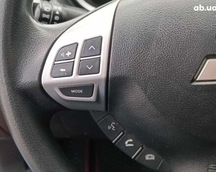 Красный Мицубиси Лансер, объемом двигателя 2 л и пробегом 136 тыс. км за 10990 $, фото 19 на Automoto.ua