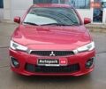 Червоний Міцубісі Lancer, об'ємом двигуна 2 л та пробігом 136 тис. км за 10990 $, фото 1 на Automoto.ua