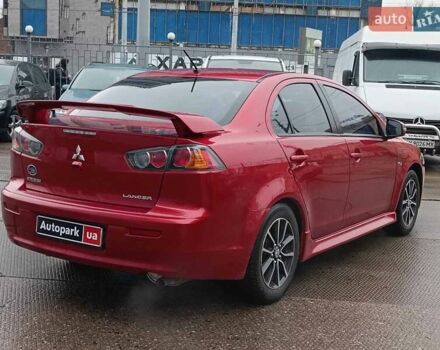 Червоний Міцубісі Lancer, об'ємом двигуна 2 л та пробігом 136 тис. км за 10990 $, фото 10 на Automoto.ua