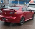 Червоний Міцубісі Lancer, об'ємом двигуна 2 л та пробігом 136 тис. км за 10990 $, фото 10 на Automoto.ua