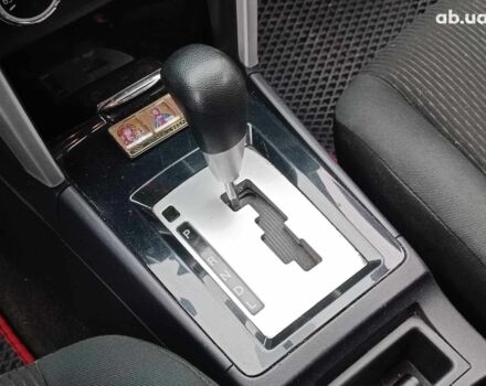 Красный Мицубиси Лансер, объемом двигателя 2 л и пробегом 136 тыс. км за 10990 $, фото 22 на Automoto.ua